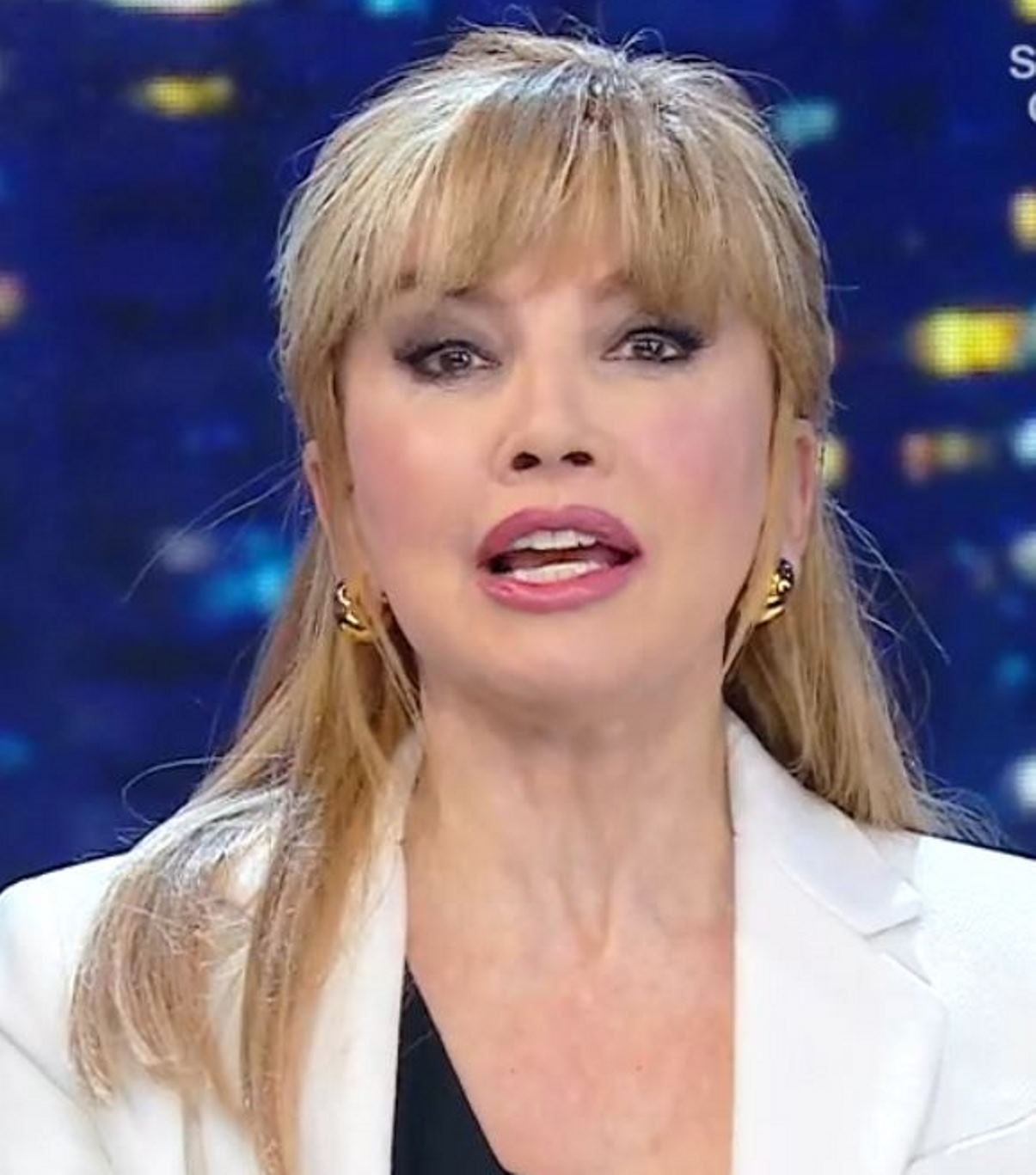 milly carlucci novità cantante mascherato